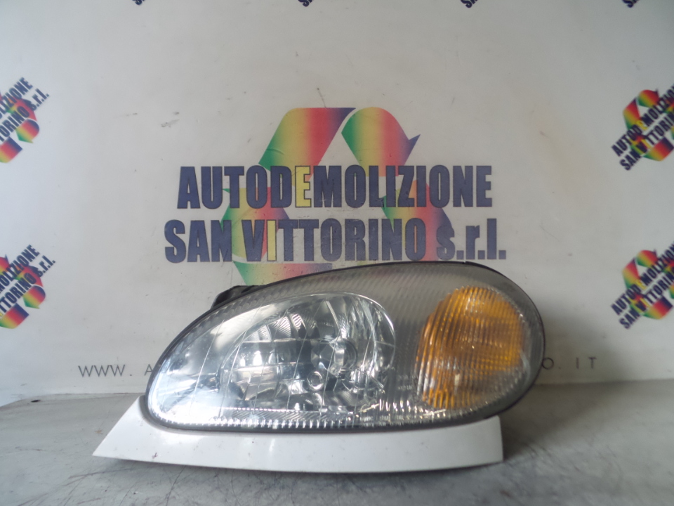 PROIETTORE SX. CHEVROLET (DAEWOO) LANOS (T100) (06/97>01/04